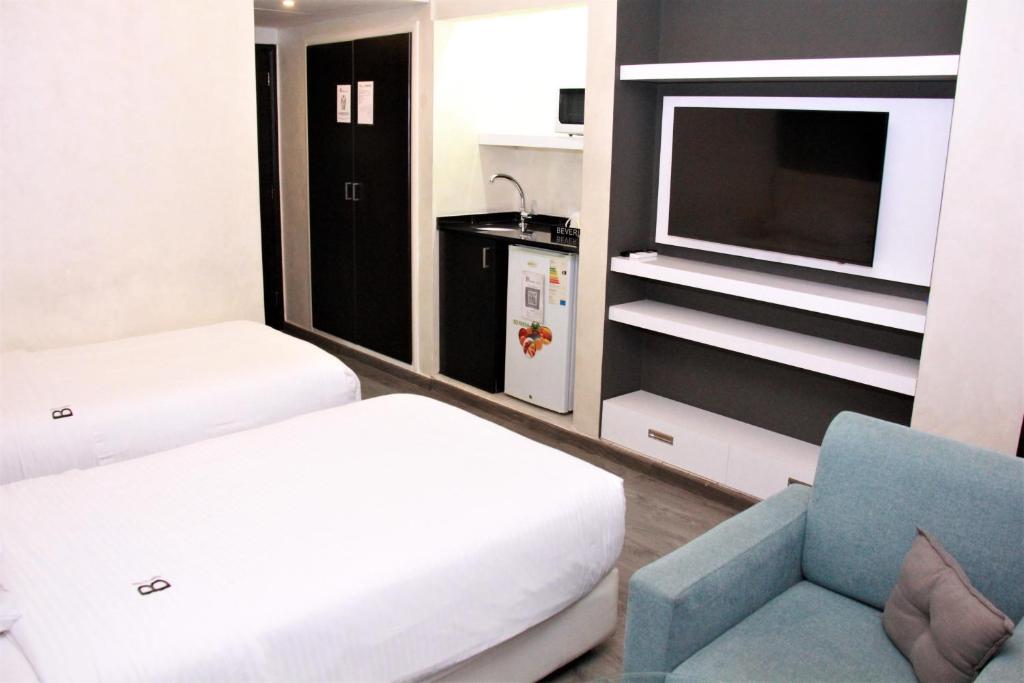 Postel nebo postele na pokoji v ubytování Beverly Hotel Beirut