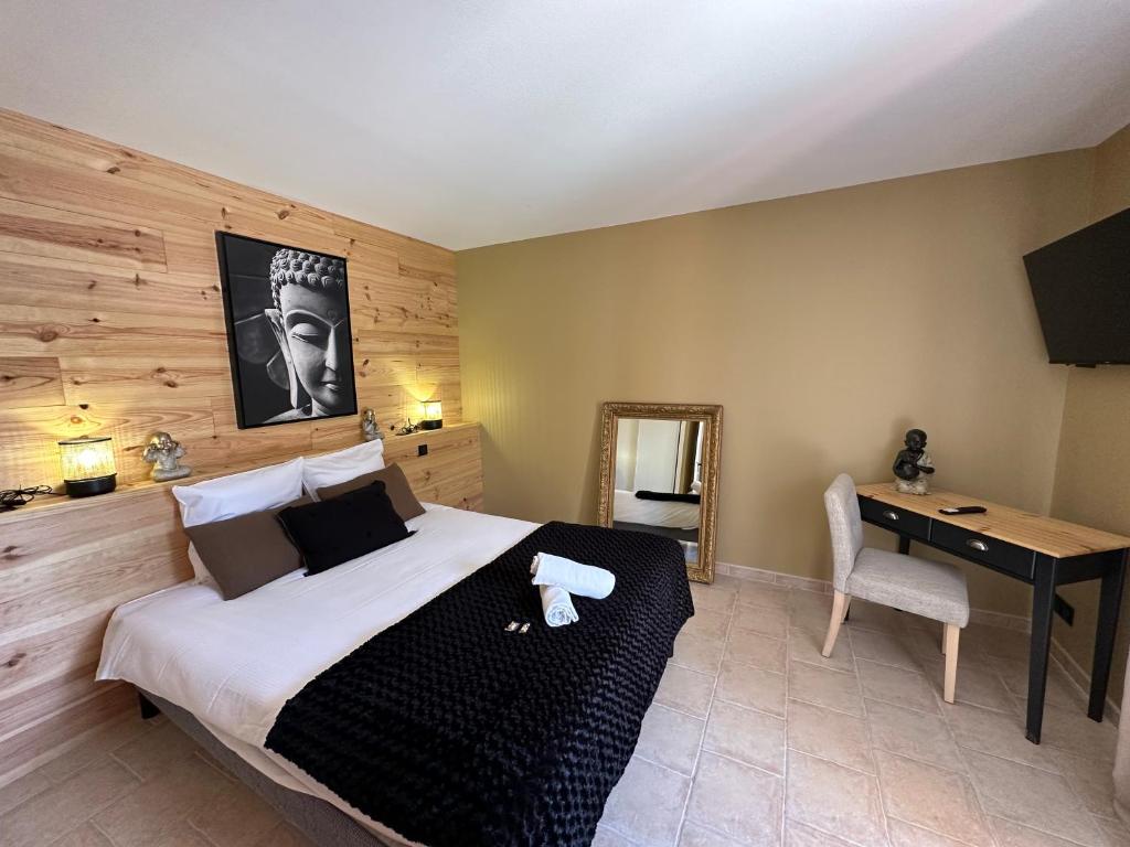 Postel nebo postele na pokoji v ubytování Bastide Saint-Thomé