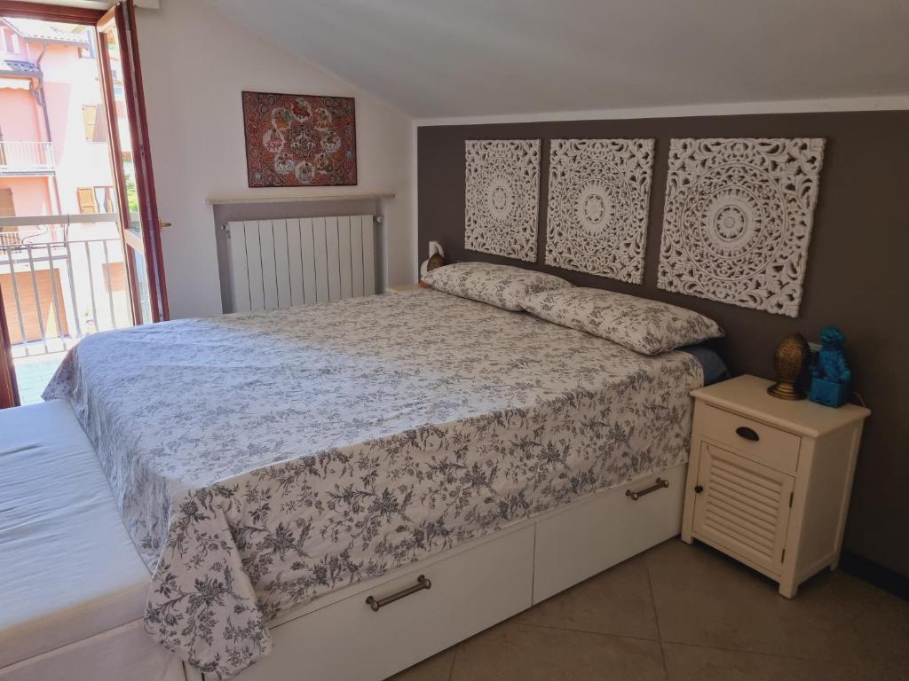 Ένα ή περισσότερα κρεβάτια σε δωμάτιο στο -Le Carillon- Jacuzzi Suite Privé close to Bergamo