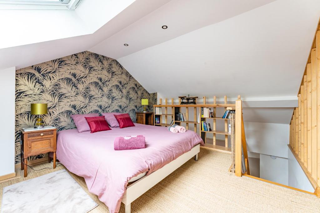 Posteľ alebo postele v izbe v ubytovaní Les Potiers 2 - charmant appartement en duplex