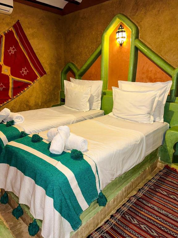 Letto o letti in una camera di RIAD AMNAY