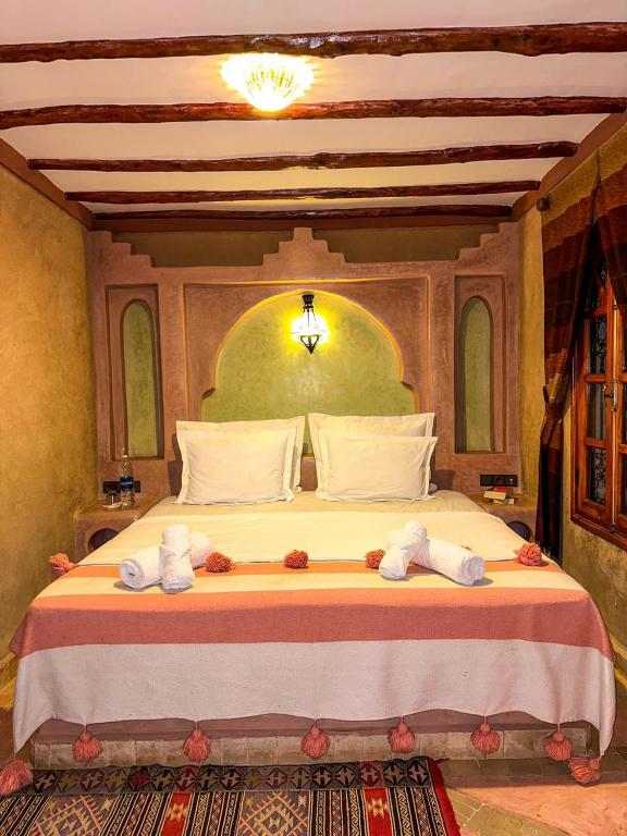 Letto o letti in una camera di RIAD AMNAY
