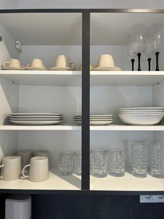 A kitchen or kitchenette at AR Rezidencia Ludmanská