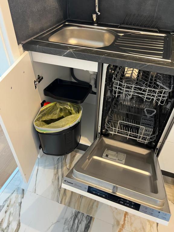 A kitchen or kitchenette at AR Rezidencia Ludmanská