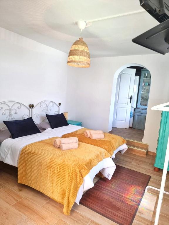 Ένα ή περισσότερα κρεβάτια σε δωμάτιο στο Casita La biznaga