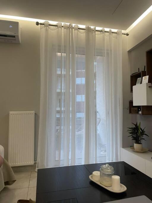 Příslušenství pro přípravu čaje a kávy v ubytování Serenity apartment