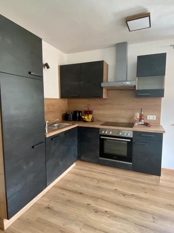 Kuchyň nebo kuchyňský kout v ubytování Apart Alpenherz