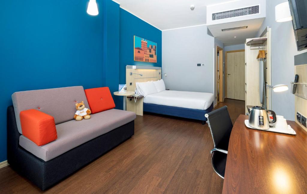 Postel nebo postele na pokoji v ubytování Holiday Inn Express Parma by IHG