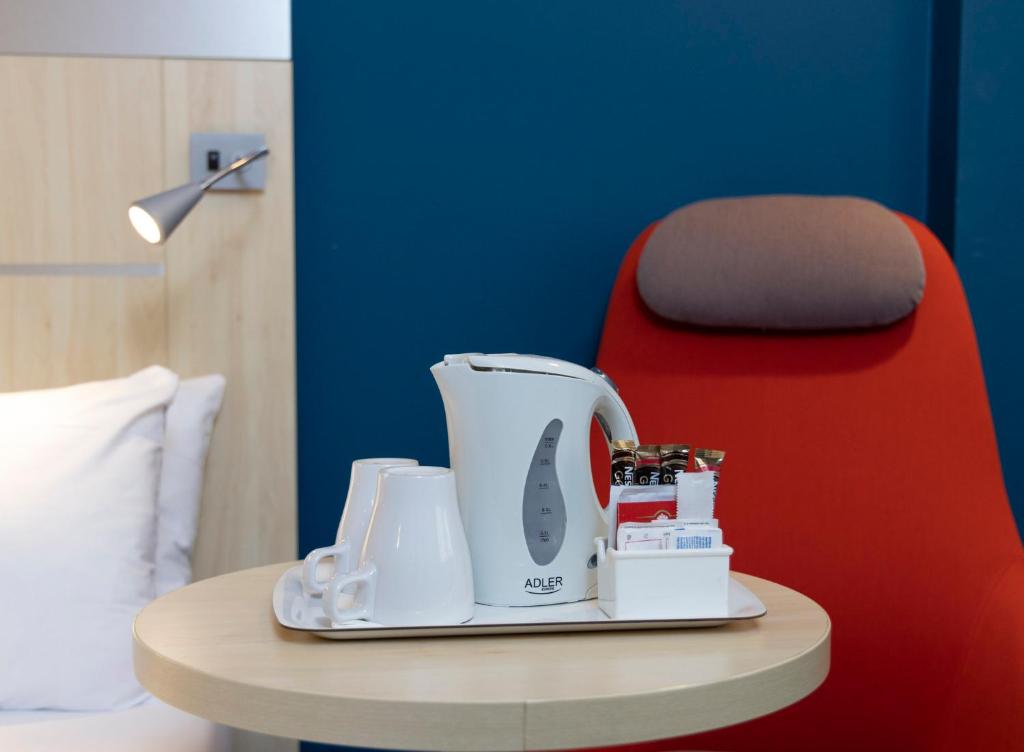Postel nebo postele na pokoji v ubytování Holiday Inn Express Parma by IHG