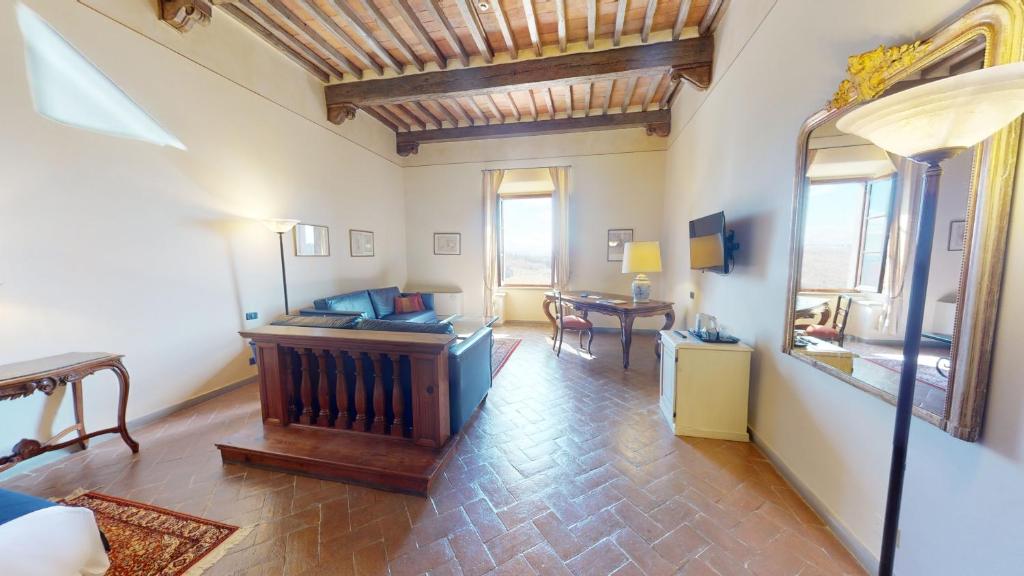 TV a/nebo společenská místnost v ubytování Hotel Palazzo Squarcialupi