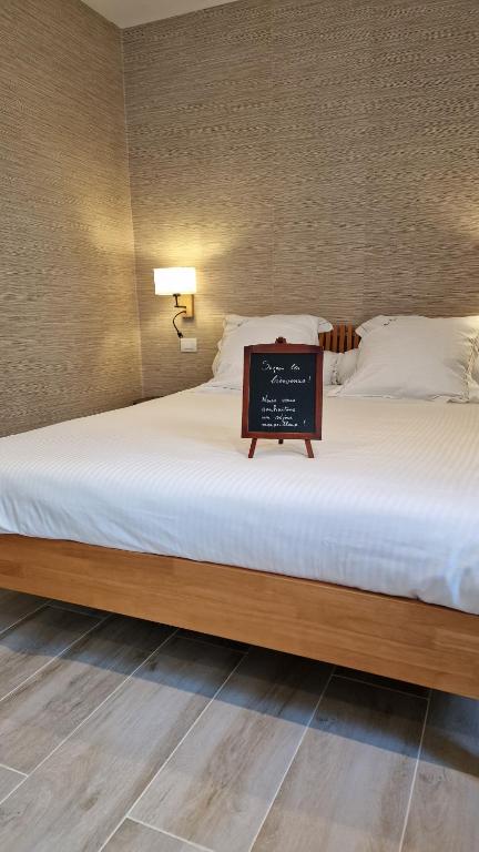 Postel nebo postele na pokoji v ubytování B&B Fine Fleur