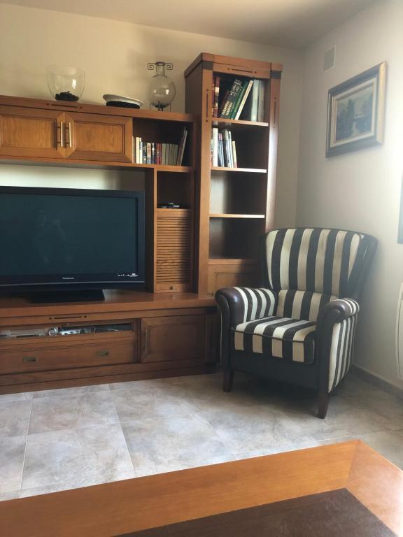 TV a/nebo společenská místnost v ubytování Casa Candelaria