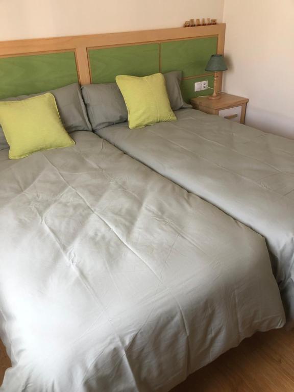Postel nebo postele na pokoji v ubytování Casa Candelaria
