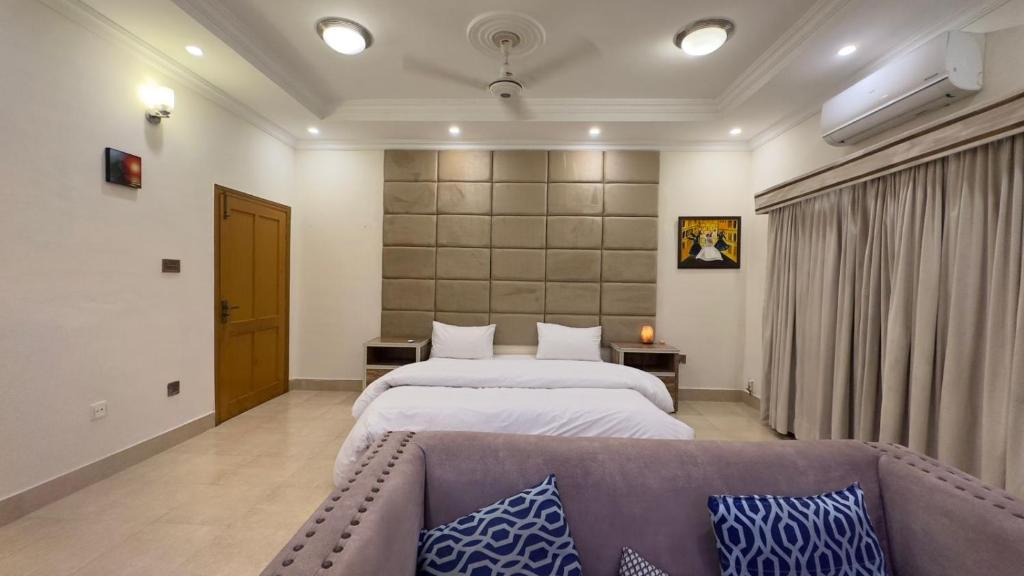 Katil atau katil-katil dalam bilik di Secure Inn Hotel