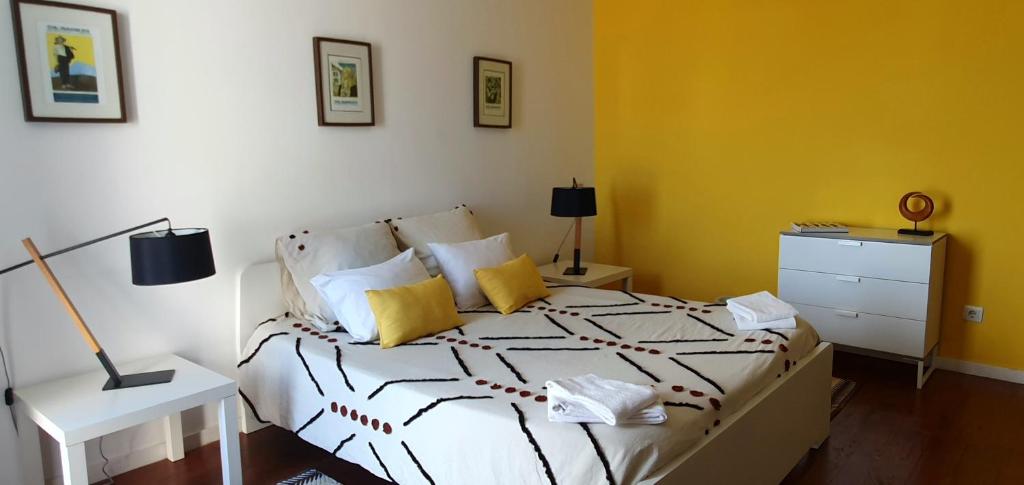 Postel nebo postele na pokoji v ubytování A-Típica GuestHouse