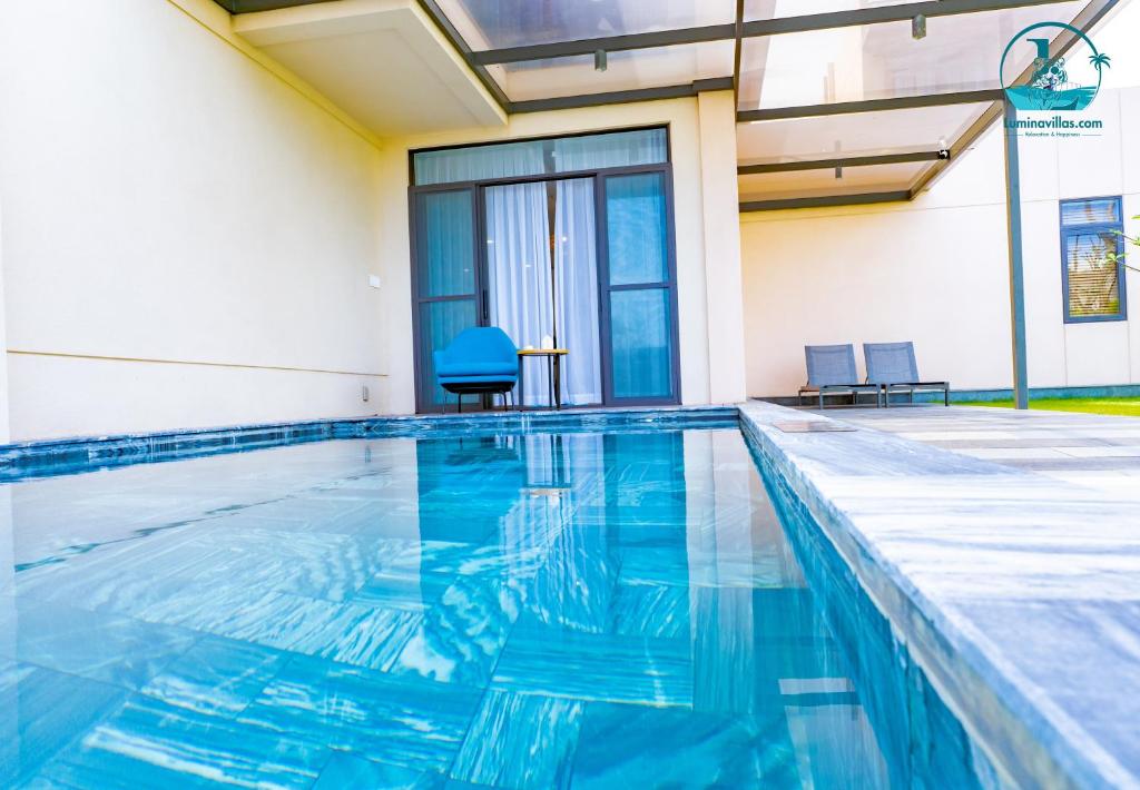 Bazén v ubytování Lumina Villas Cam Ranh, Bai Dai beach luxury resort villas nebo v jeho okolí