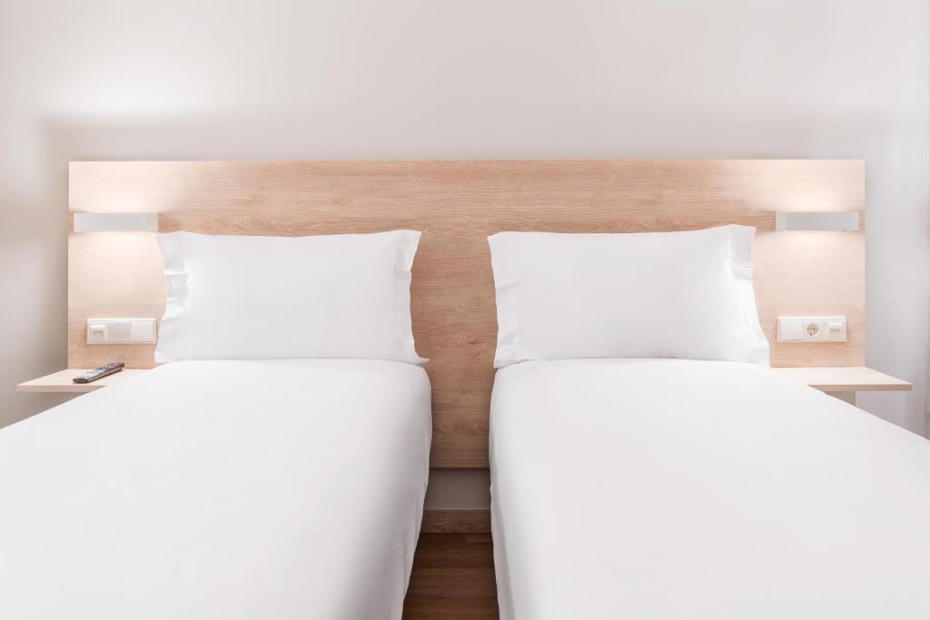Postel nebo postele na pokoji v ubytování Moov Hotel Lisboa Oriente