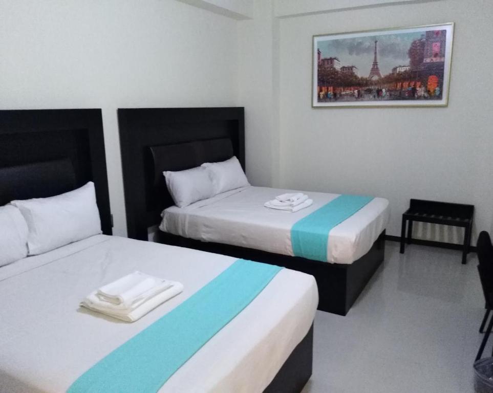 Een bed of bedden in een kamer bij Hotel Real Jaguar