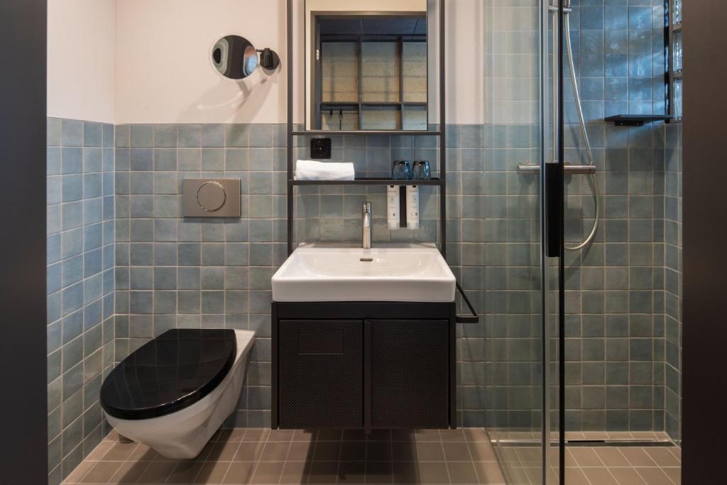Koupelna v ubytování Tailormade Hotel LEO St Gallen