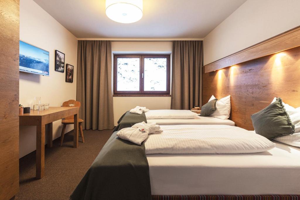 Posteľ alebo postele v izbe v ubytovaní Das Glemm Hotel - Joker Card Partner