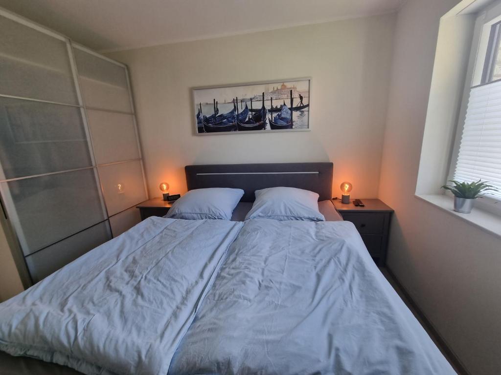 Postel nebo postele na pokoji v ubytování Ferienhaus am Bernsteinsee