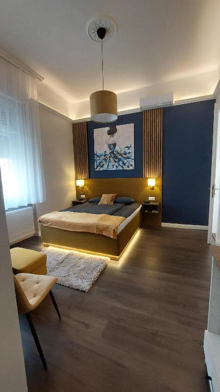 Posteľ alebo postele v izbe v ubytovaní Glamour Apartman