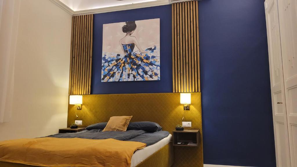 Posteľ alebo postele v izbe v ubytovaní Glamour Apartman