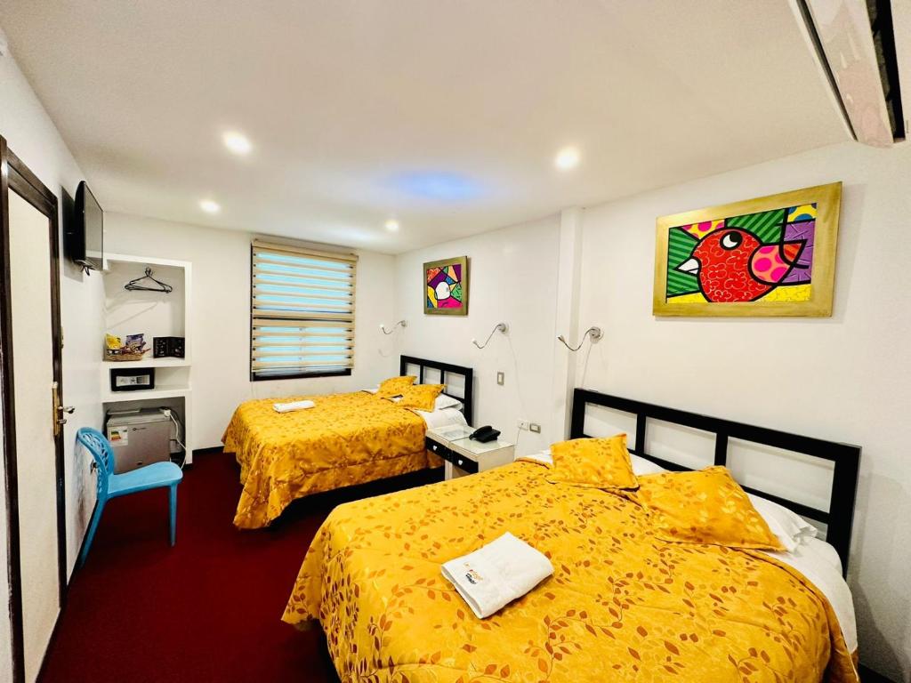 Postel nebo postele na pokoji v ubytování Le Prince Arica