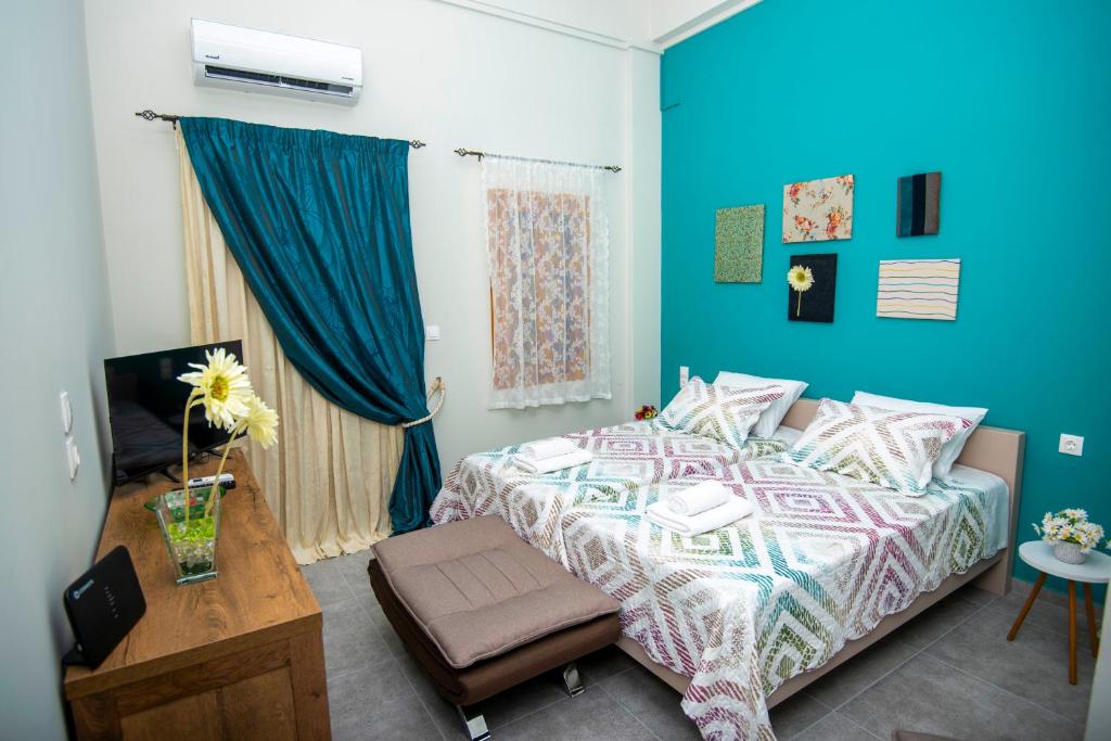 Postel nebo postele na pokoji v ubytování Lithos apartments