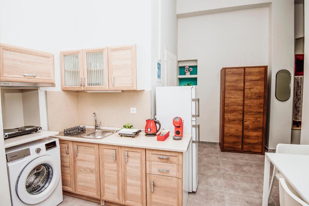 Kuchyň nebo kuchyňský kout v ubytování Lithos apartments