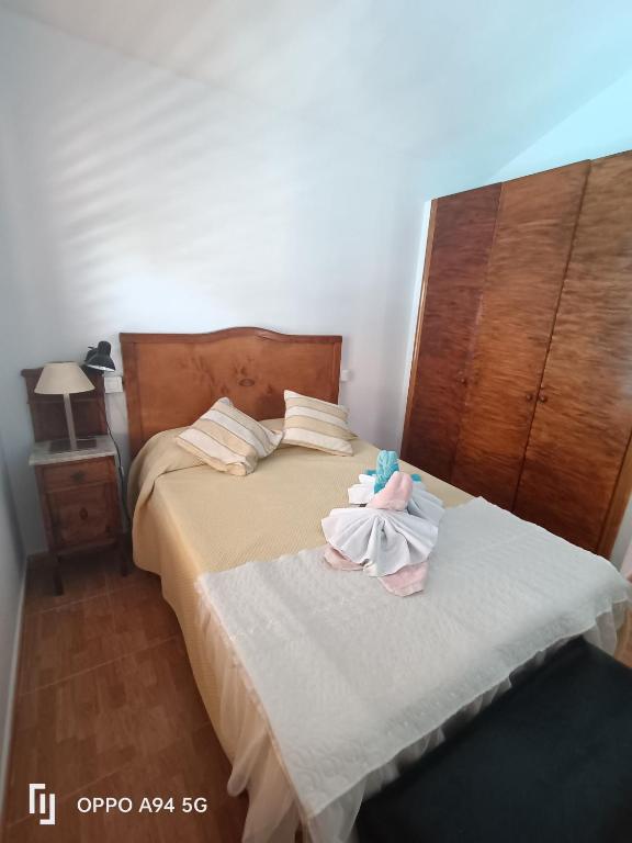 A bed or beds in a room at Chalet Juana La Concha Valle de Agaete