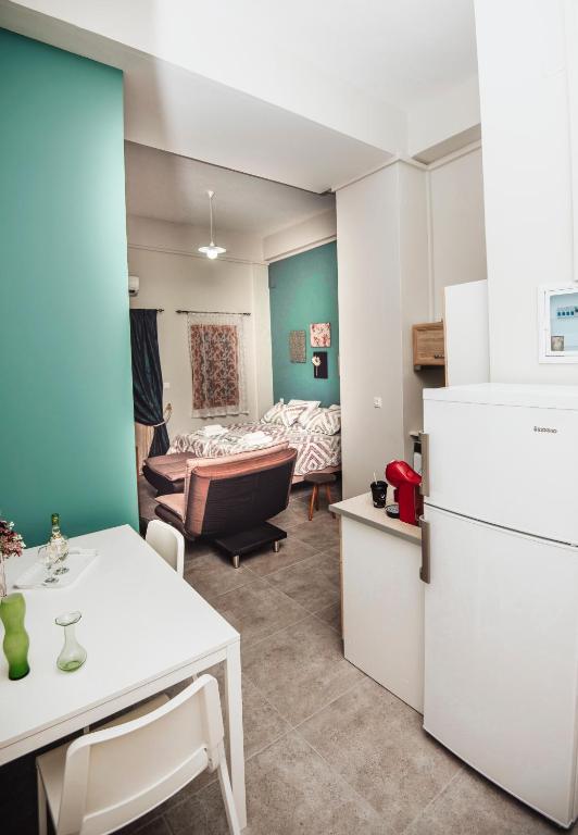 Postel nebo postele na pokoji v ubytování Lithos apartments