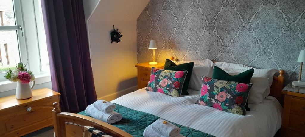 מיטה או מיטות בחדר ב-Strome Lodge
