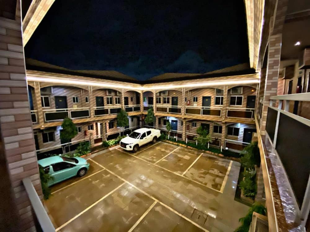 an aerial view of a apartment complex at night at Hôtel Excelle Xior in Yaoundé