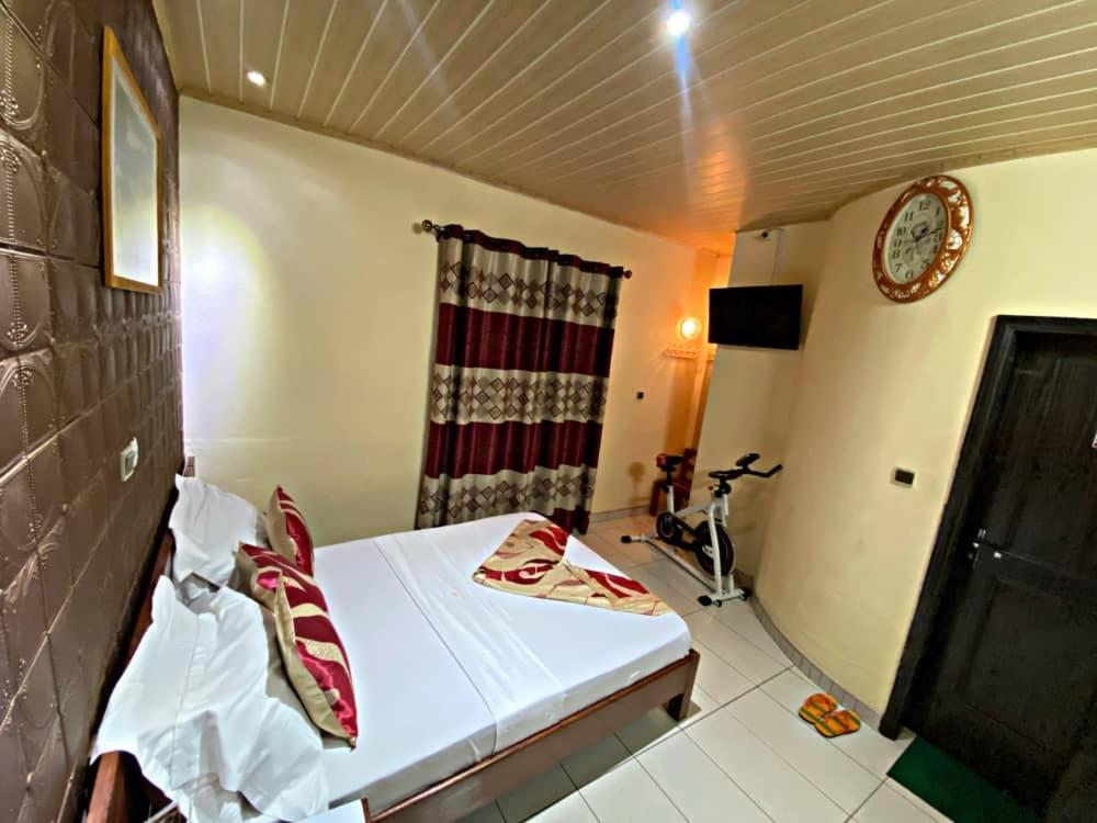 Postel nebo postele na pokoji v ubytování Hôtel Excelle Xior