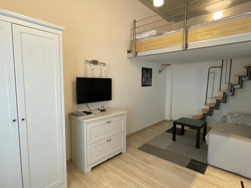 TV a/nebo společenská místnost v ubytování Stadtapartment WOHNEN48.AT