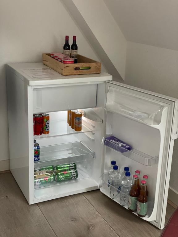 Nápoje v ubytování Bed & Koffie, Op de Spinbaan