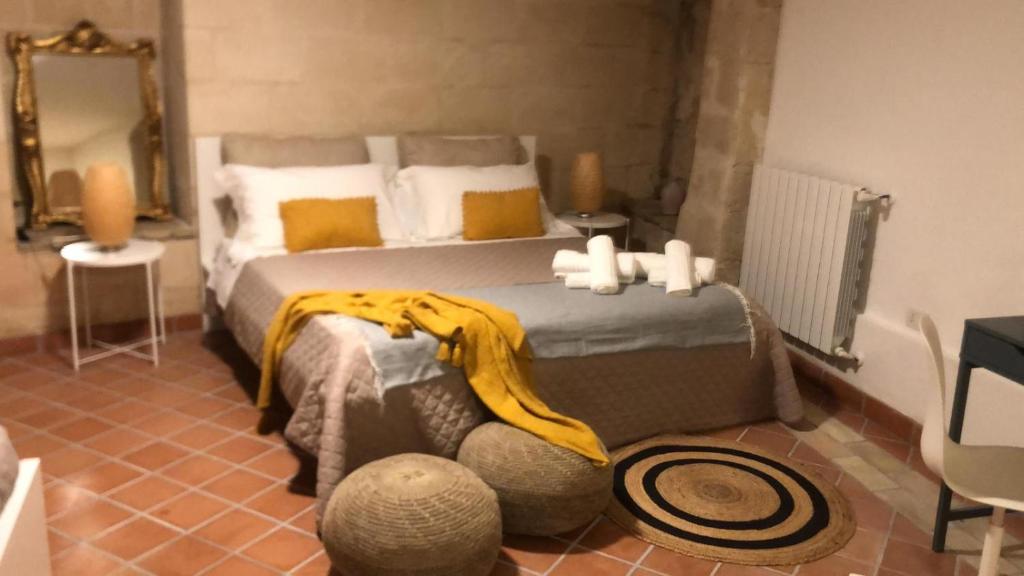 Postel nebo postele na pokoji v ubytování Dimora 1919 Luxury Loft