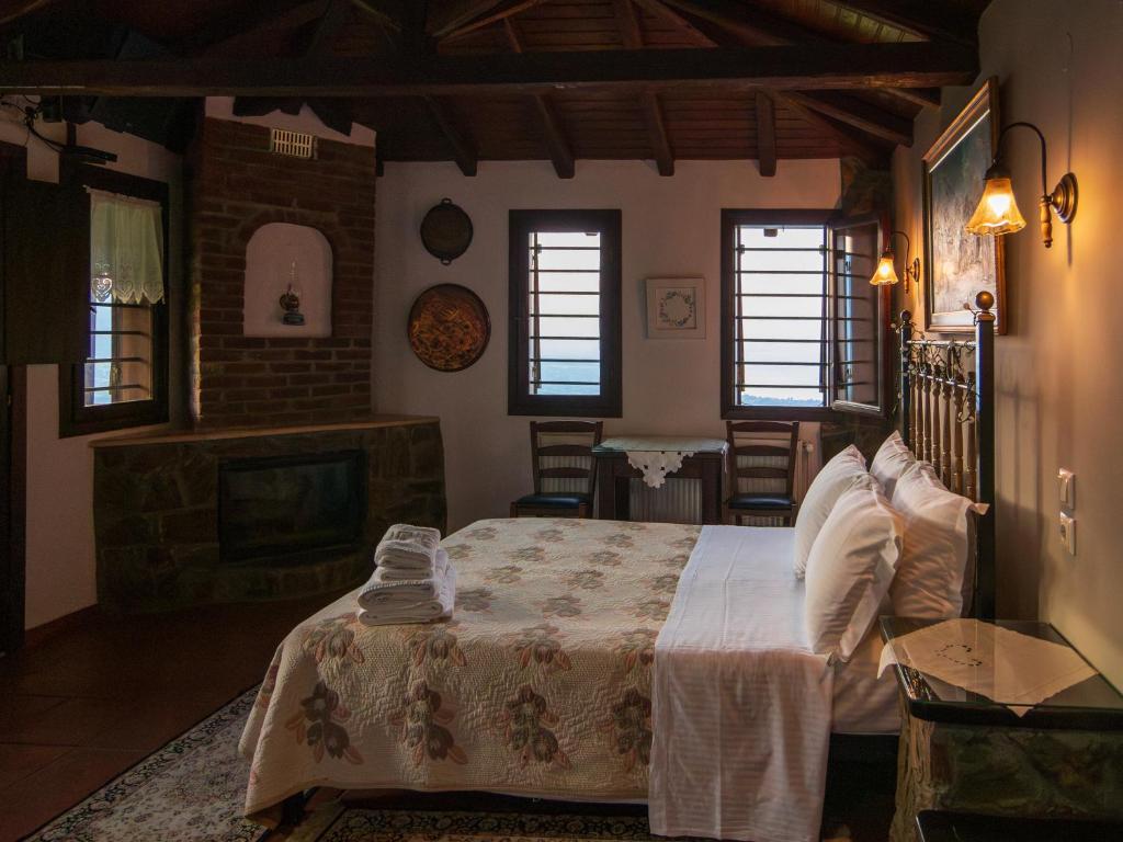 Postel nebo postele na pokoji v ubytování Guesthouse Oneiro