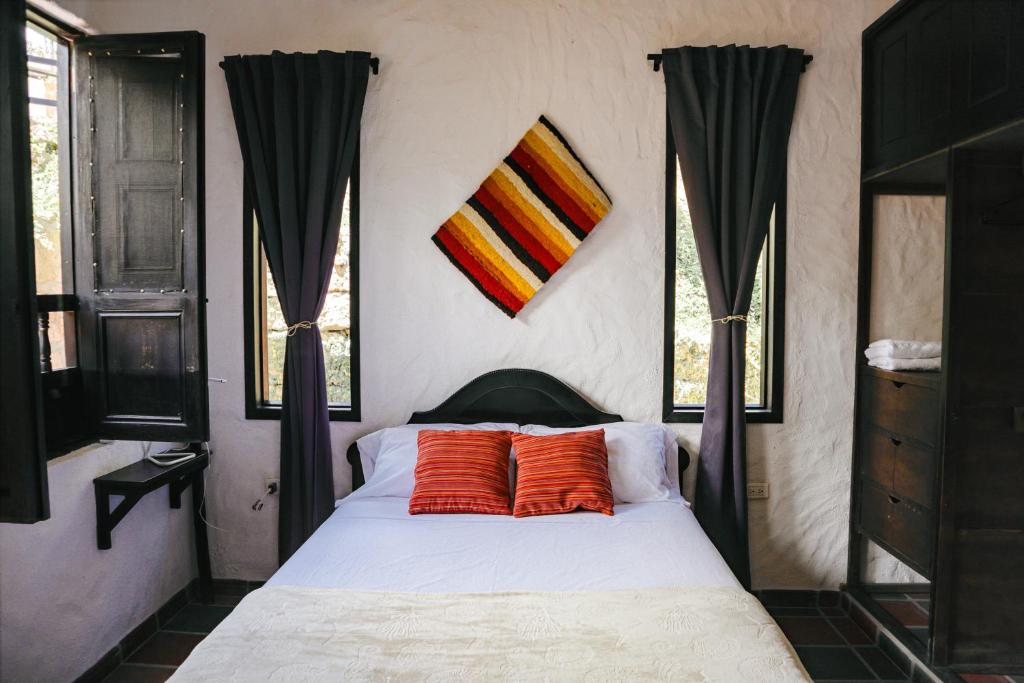 Postel nebo postele na pokoji v ubytování Casa Luna Hotel Campestre & Spa