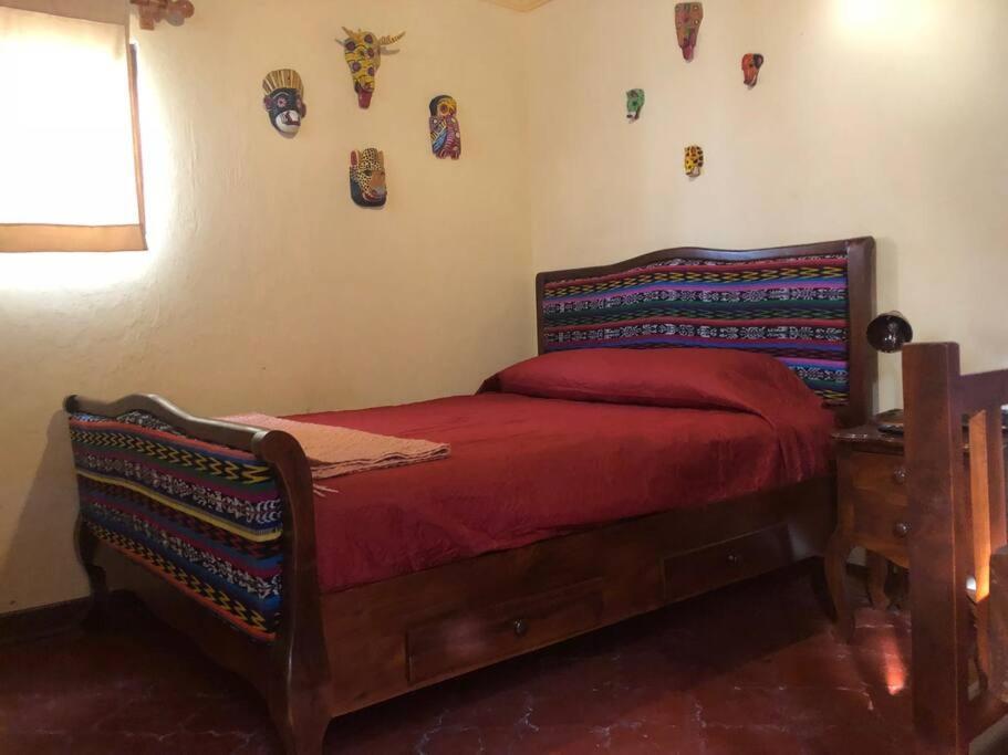 Postelja oz. postelje v sobi nastanitve Casa única en casco de Antigua Guatemala