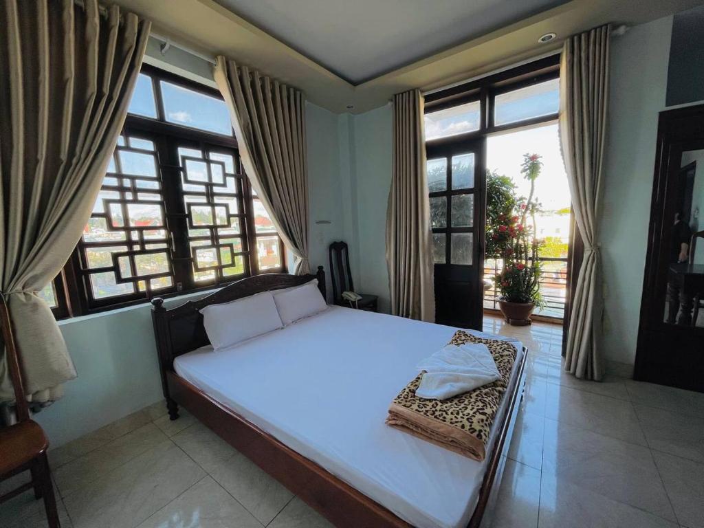 Manh Hung Hotel - غرفة اجتماعات متزامنة مع اتفاق بالكوني