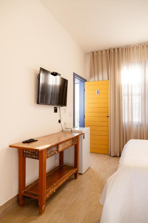 Postel nebo postele na pokoji v ubytování Pousada Pouso de Laura
