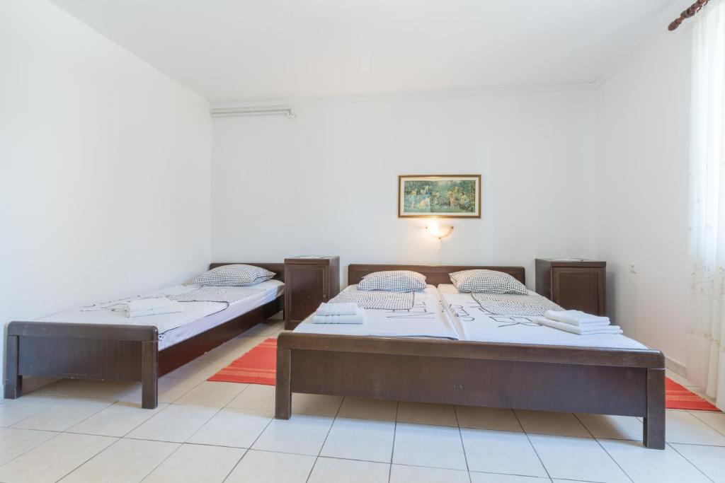 Postel nebo postele na pokoji v ubytování Apartments with parking spaces Tar, Porec - 6948