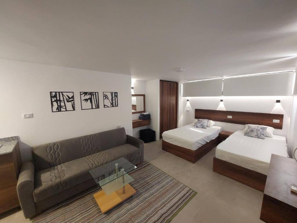 Postel nebo postele na pokoji v ubytování Sola inn