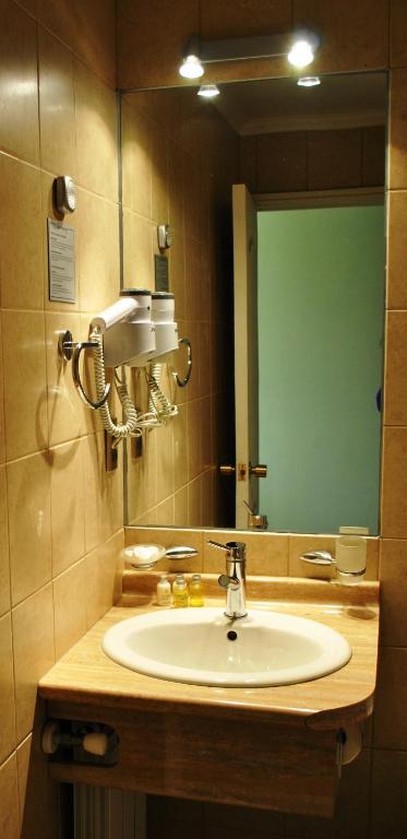Koupelna v ubytování Hotel Carpa Manzano