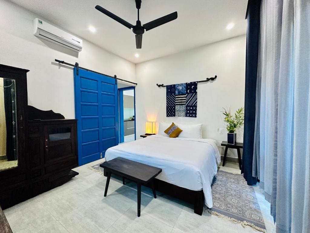 Postel nebo postele na pokoji v ubytování Chez Mimosa Hoi An - LUA Retreat