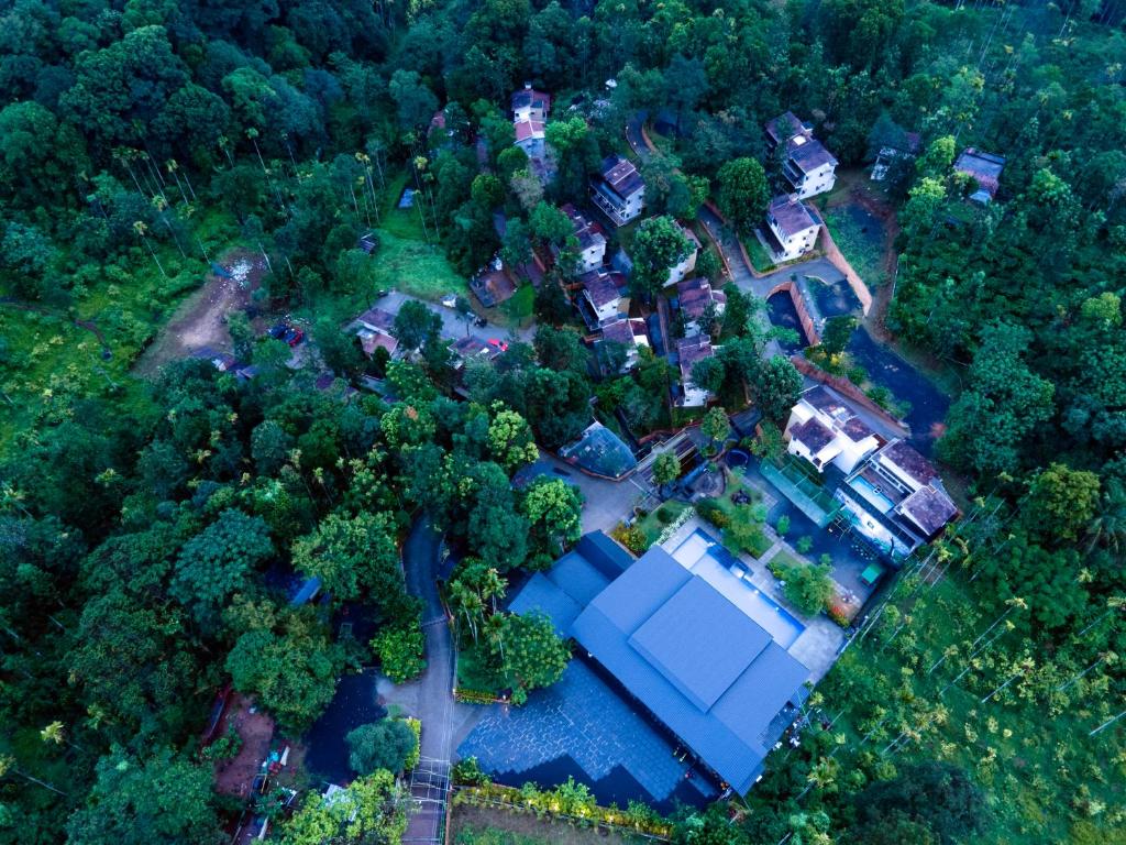 an aerial view of a house in the woods at Safari Hills in Vayittiri