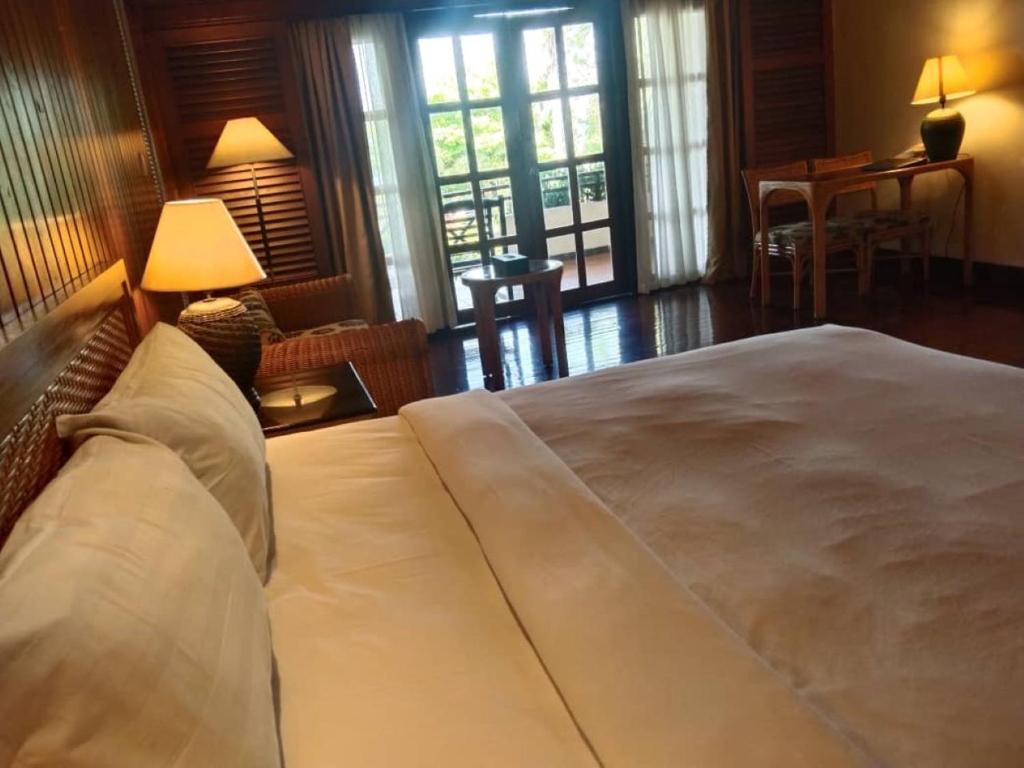 Letto o letti in una camera di Tiara Labuan Hotel