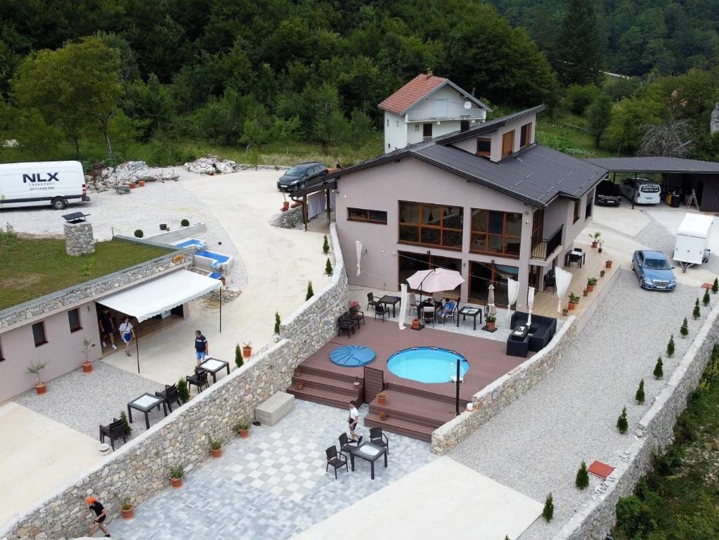 an aerial view of a house with a swimming pool at Josanica Bed&Breakfast in Konjic